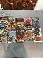 All ten Marvel graphic novels laid out on table