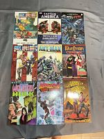 Nine graphic novels laid out in three-by-three grid