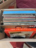 Top view of box showing stack of LP records with Glenn Miller album visible