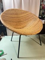 Full view of wicker chair showing overall design
