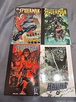 Front covers of all four trade paperbacks