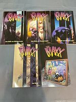 Front covers of all five The Maxx trade paperbacks laid out