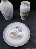 Group shot of both vases and plate