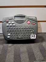 Front view of Dymo LabelMANAGER 150 showing keypad and damaged display