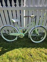 Right side view of entire bicycle showing frame, wheels, chain guard and fenders