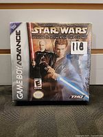 Front of sealed Game Boy Advance game box showing title, artwork, ESRB rating and THQ logo