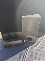 Front view of entire Sony speaker set with subwoofer, center speaker and three satellites