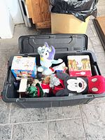 Overall view of tote with assorted Christmas items