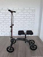 Full view of Drive knee scooter showing frame, wheels, knee platform, handlebar