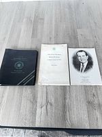 Three press notes items for Nixon 1970 European trip, binder and two booklets displayed