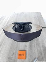 Full view of Sony NAS-CZ1 showing overall design and disc lid open