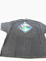 Full back view of T-shirt showing mission patch graphic