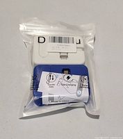 Sealed pack containing one retractable charging cable