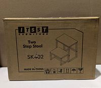 Front of sealed retail carton showing brand, illustration and model