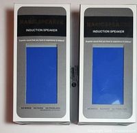 Front view of two boxed Debco Magic Speaker CU6652 units