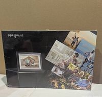 Front of sealed Weipan P100 photo frame box showing product images and branding