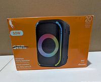 Front of retail box showing speaker image and specifications