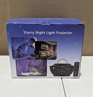 Front of retail box showing projector image and remote