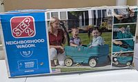 Front of retail box showing Step2 Neighborhood Wagon graphics and product image