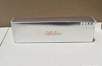 Closed silver Ukliss box front
