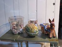 Full lot showing shells container, Easter egg, donkey planter, LED lights