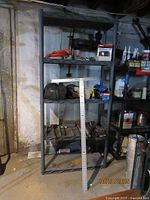 Full view of plastic shelving with assorted tools stored on shelves