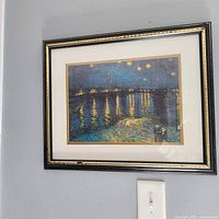 Full view of framed print on wall, showing frame, mat and entire artwork