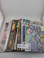 Stack of 18 Marvel comics spine-out, Punisher #1 visible on top