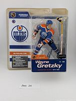 Front view of sealed Wayne Gretzky figure in packaging