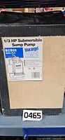 Front of carton showing Blue Angel BC833 1/3 HP Submersible Sump Pump label