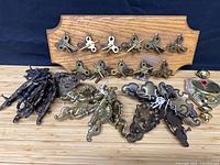 Full lot showing keys on board and assorted hardware pieces