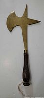 Full view of brass trench art halberd form