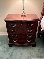 Full view of Heritage mahogany 4-drawer nightstand with brass pulls