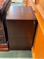 Front view of dark brown two-drawer file cabinet