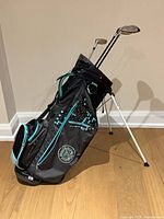 Full view of Sun Mountain stand bag with clubs visible