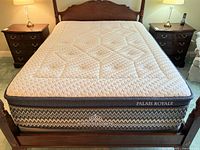 Overall view of mattress on bed frame