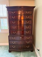 Front view of mahogany 8-drawer highboy dresser
