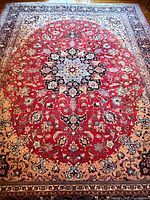 Full view of entire rug in room showing design and size