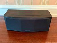 Speaker with grille attached