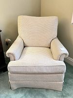 Front view of upholstered armchair