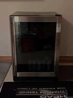 Front view of glass door bar fridge