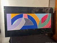 Full view of framed abstract print