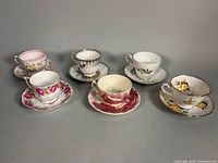Group shot of all six teacup and saucer sets