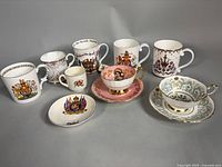 Group shot of all mugs, teacups and saucers