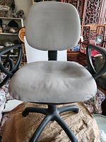 Front view of chair showing seat, backrest and armrests