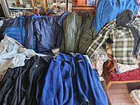 Assortment of eight jackets laid out showing colors and styles