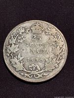 Reverse showing 25 CENTS CANADA 1930 within maple leaf wreath and crown