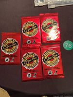 Front view of five sealed red foil 1993 O-Pee-Chee Premier hockey card packs