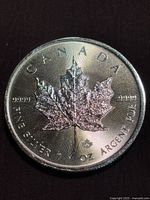 Obverse side of the 2015 Canadian Silver Maple Leaf showing maple leaf design and purity marks