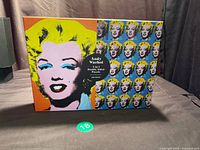 Front of factory-sealed puzzle box showing Warhol Marilyn Monroe artwork and 500-piece designation